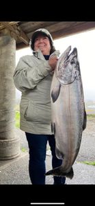 Fisherman with a large catch at Gold Beach