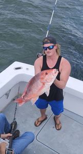 A person fishing in Panama City