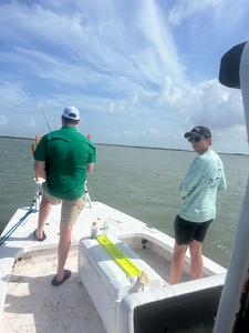 Deep sea jigging with light tackle in the clear waters of South Padre Island, Texas