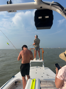 Battling the waves and the big ones on the Texas coast!
