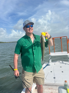 Reeling in the big one on a clear day in South Padre Island!
