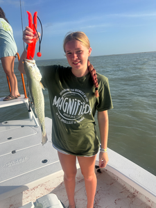 Angler battles the waves and weather for a thrilling deep sea fishing adventure in South Padre Island, TX.