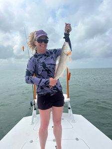 Reeling in the big one on a cloudy day at South Padre Island!