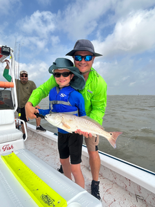 A mighty 19-inch redfish landed after a thrilling deep sea jigging session at South Padre Island, TX