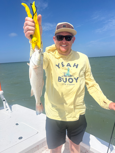 Reeling in a tasty Redfish on the coast of South Padre Island!