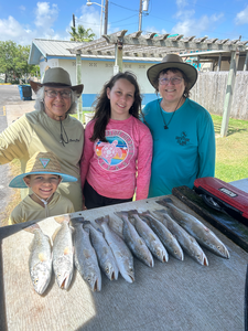 Triple redfish triumph on a crystal-clear day at South Padre!