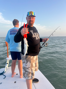 Hooked a feisty Spotted Weakfish while casting the deep waters of South Padre Island!