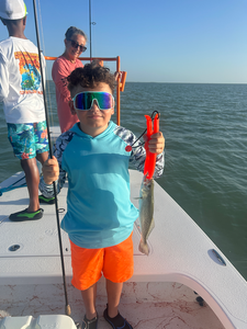 Hooked into a feisty Spotted Weakfish while deep sea fishing at South Padre Island!