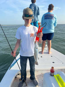 Reeling in a stunning Spotted Weakfish on a day of adventure in South Padre Island!