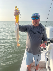 A spotted weakfish reeled in with some deep sea jigging magic!