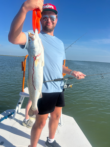 Big Spotted Weakfish reeled in during a perfect day of deep sea action!