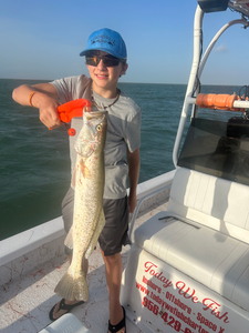 Reeling in the best with a Spotted Weakfish on a partly cloudy day!
