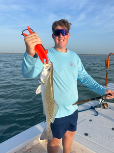 A nice Spotted Weakfish landed on a day of mixed weather and varied fishing techniques!