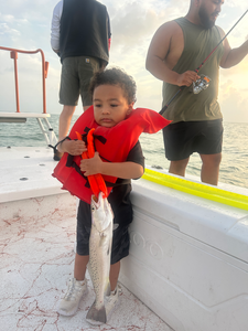 Reeling in the best fishing experience with a Spotted Weakfish off South Padre Island!