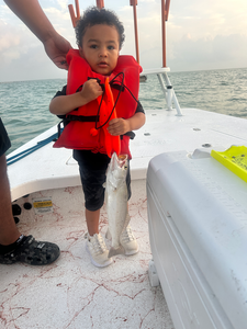 Reeling in the best Spotted Weakfish while storms brew on the horizon!