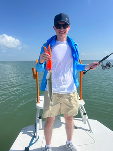 Reeling in the best fishing spots with a Spotted Weakfish off South Padre!