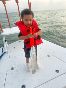 Reeling in the best fishing with a Spotted Weakfish off South Padre Island!