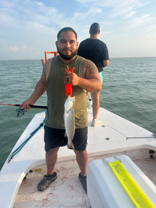 Reeling in the best fishing experience with a Spotted Weakfish off South Padre Island!
