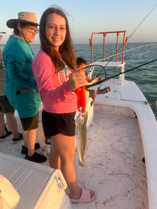 Reeling in the best with a sleek Spotted Weakfish off South Padre!