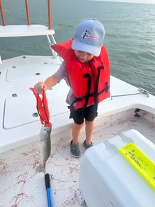 Reeling in the best fishing experience with a Spotted Weakfish off South Padre Island!