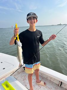 A magnificent Spotted Weakfish reeled in during the perfect partly cloudy day!