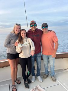 4 people fishing at Muskegon