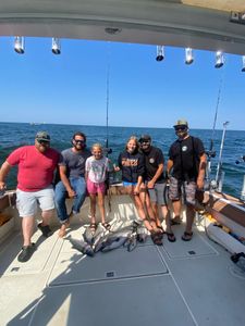Group of 6 people fishing in MI