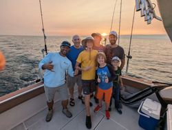 Group of 7 people fishing in MI