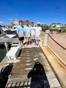 Four people fishing in Morehead City