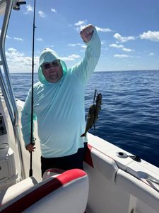 A person fishing on the shore of Little Torch Key