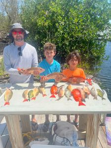 Two fishermen catching fish in Florida