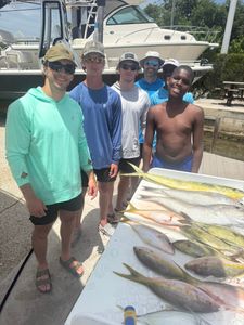 Fishing charter catch display showing yellowfin tuna and mahi mahi from Little Torch Key FL