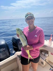 Excited for capture time with her Mahi-mahi! 