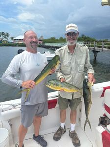 Two anglers fishing in FL with 3 fish