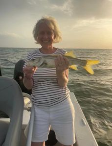 Person enjoying fishing and water sports in Sarasota