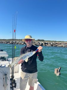 A photo of two people fishing in Port Canaveral