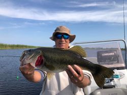 Fisherman holding a 28-inch fish in FL