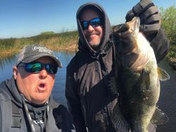 Two people fishing in Fellsmere