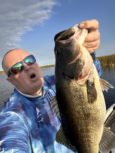 Angler fishing in Florida with 1 fish
