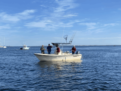Three people fishing in Massachusetts