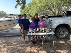 Group of 6 people fishing in Whitney location