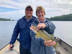 Two anglers fishing in Nestor Falls