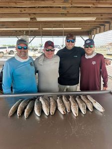 5 people enjoying best, great fishing trip in TX