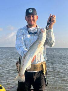 A lone angler fishes in TX
