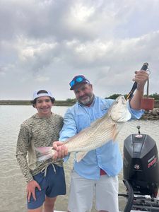 Two people fishing in Matagorda