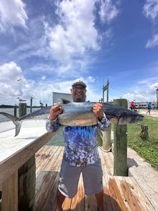 King mackerel catch displayed on fishing dock in Matagorda TX