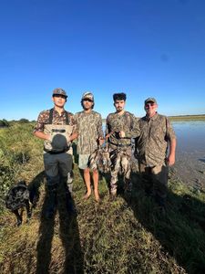4 people enjoying fishing and hunting in Matagorda