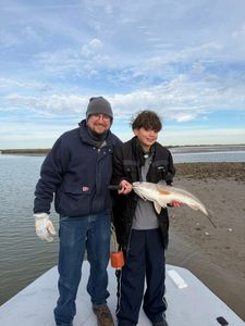 Successful redfish catch on fishing boat in Matagorda TX waters