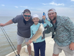 A single redfish, measuring 12 inches, caught in Matagorda