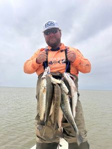 Two spotted weakfish being caught while fishing in Matagorda